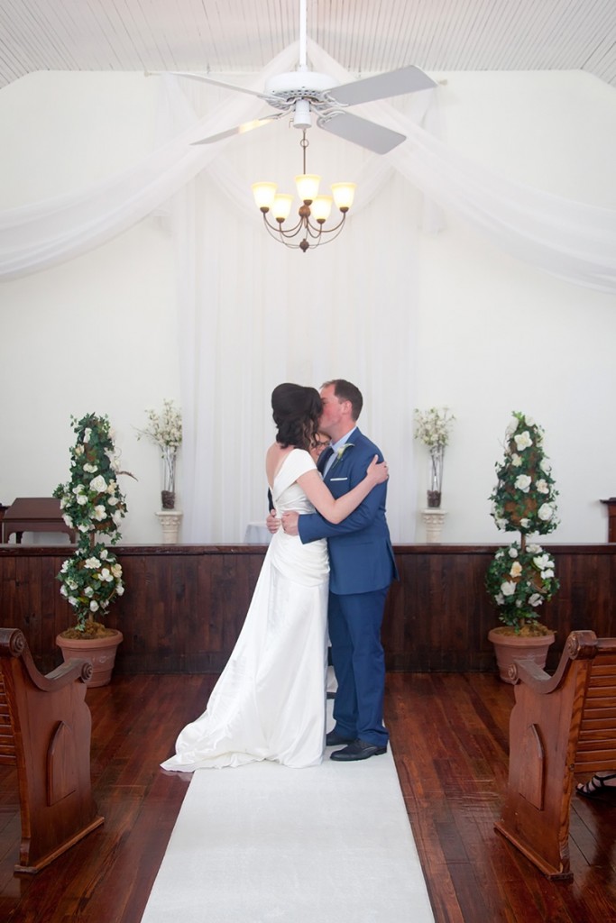 Clare & David's first kiss as husband and wife at the Winter Park Wedding Chapel